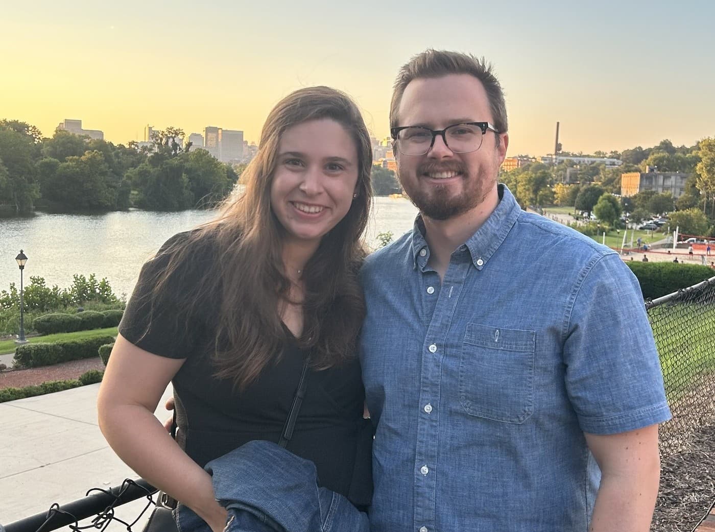 Erik and his wife smiling together outdoors in Richmond
